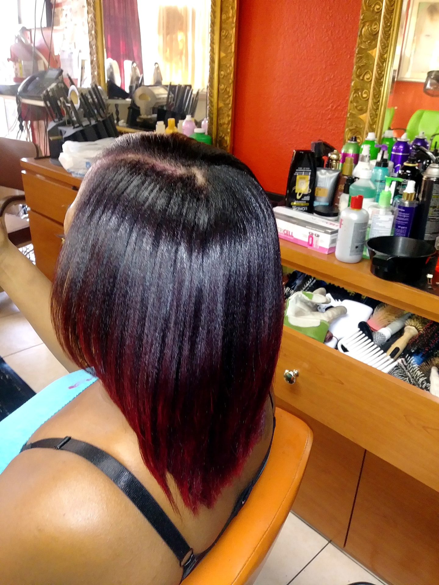 Burgundy Silk Press Bob — hair by Dominican Hairdresser Johanny