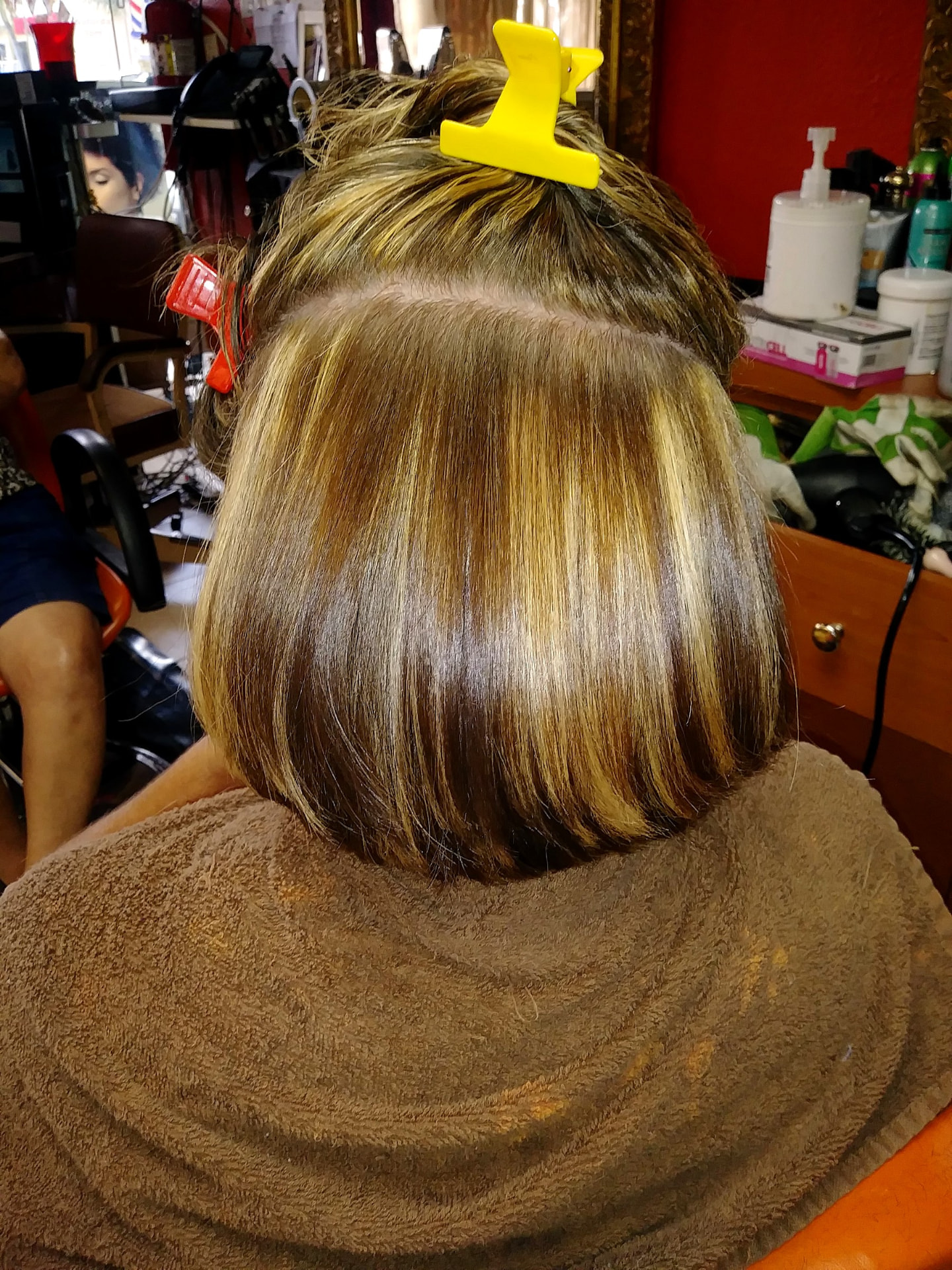 Highlighted Bob — hair by Dominican Hairdresser Johanny