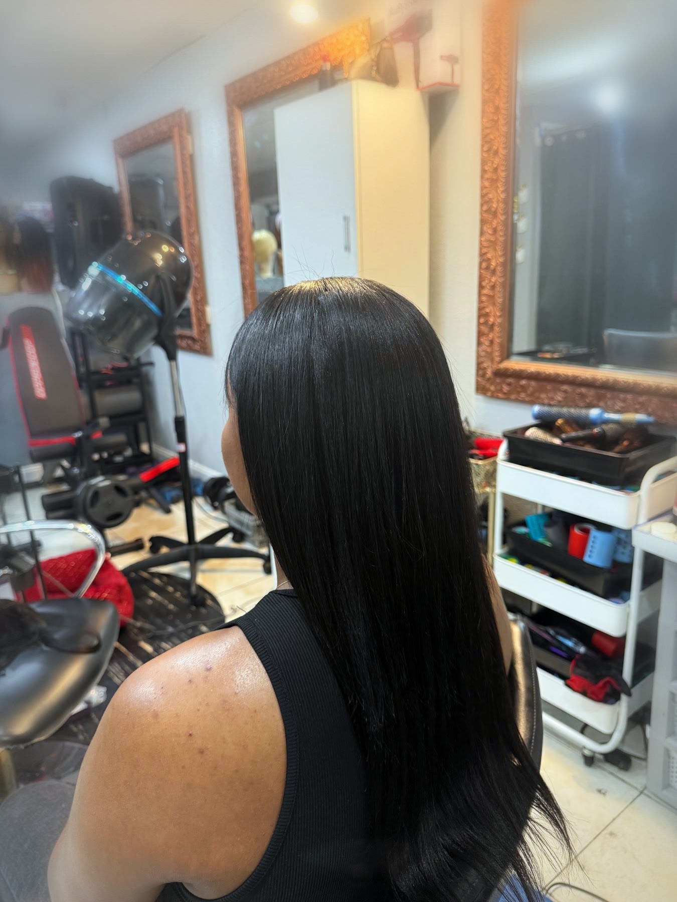 Long black Dominican blowout silk press by Johanny, Pompano Beach