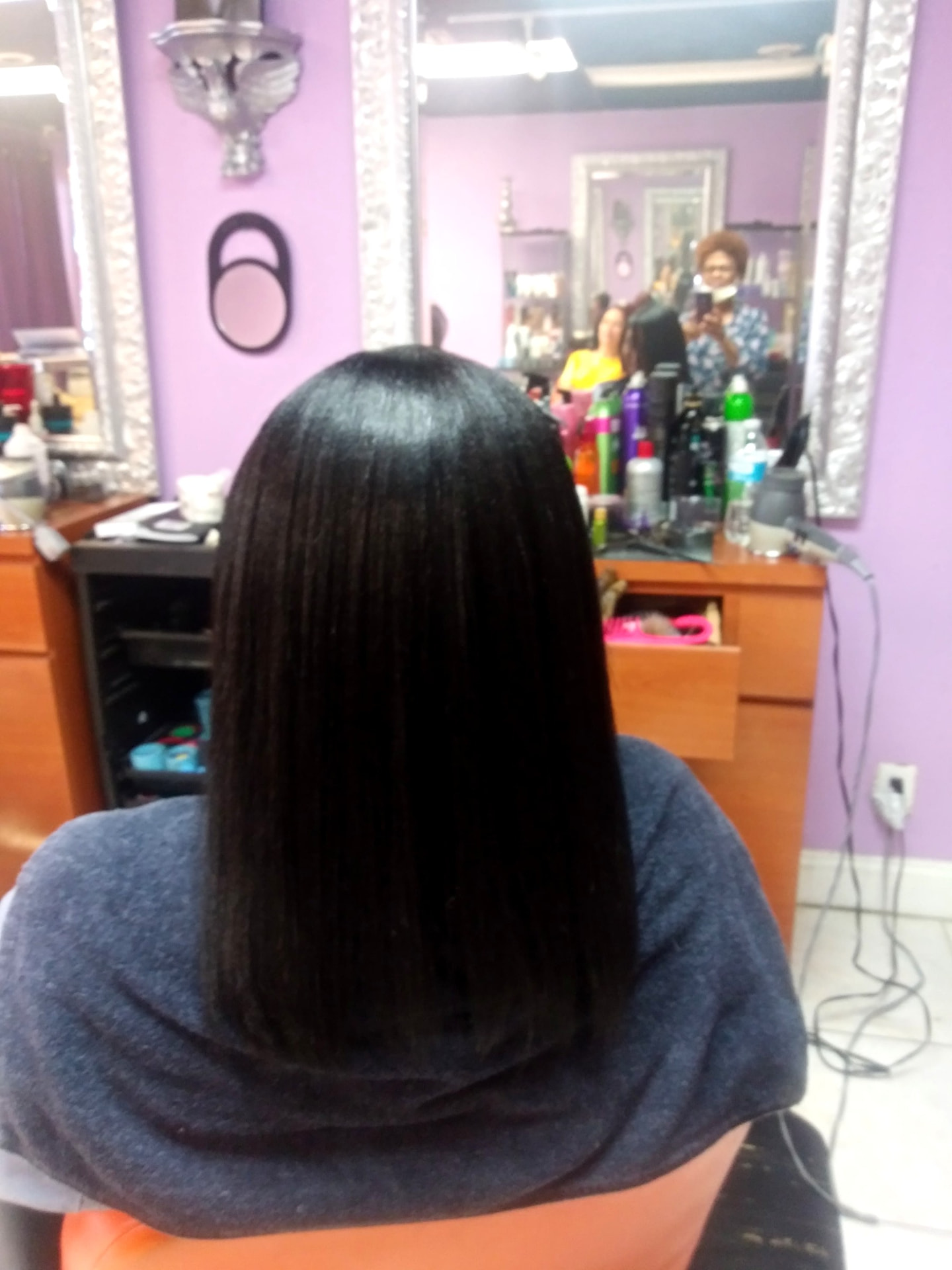 Sleek Silk Press — hair by Dominican Hairdresser Johanny