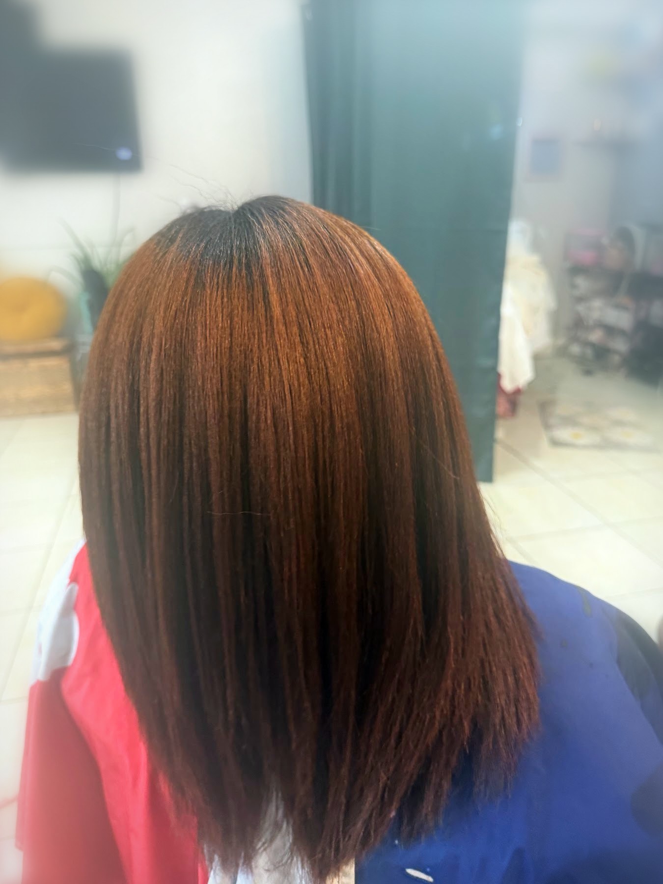 Copper brown color with straight blowout by Johanny, Pompano Beach